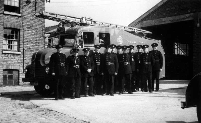 Cheshire County fire brigade with tender outside fire station